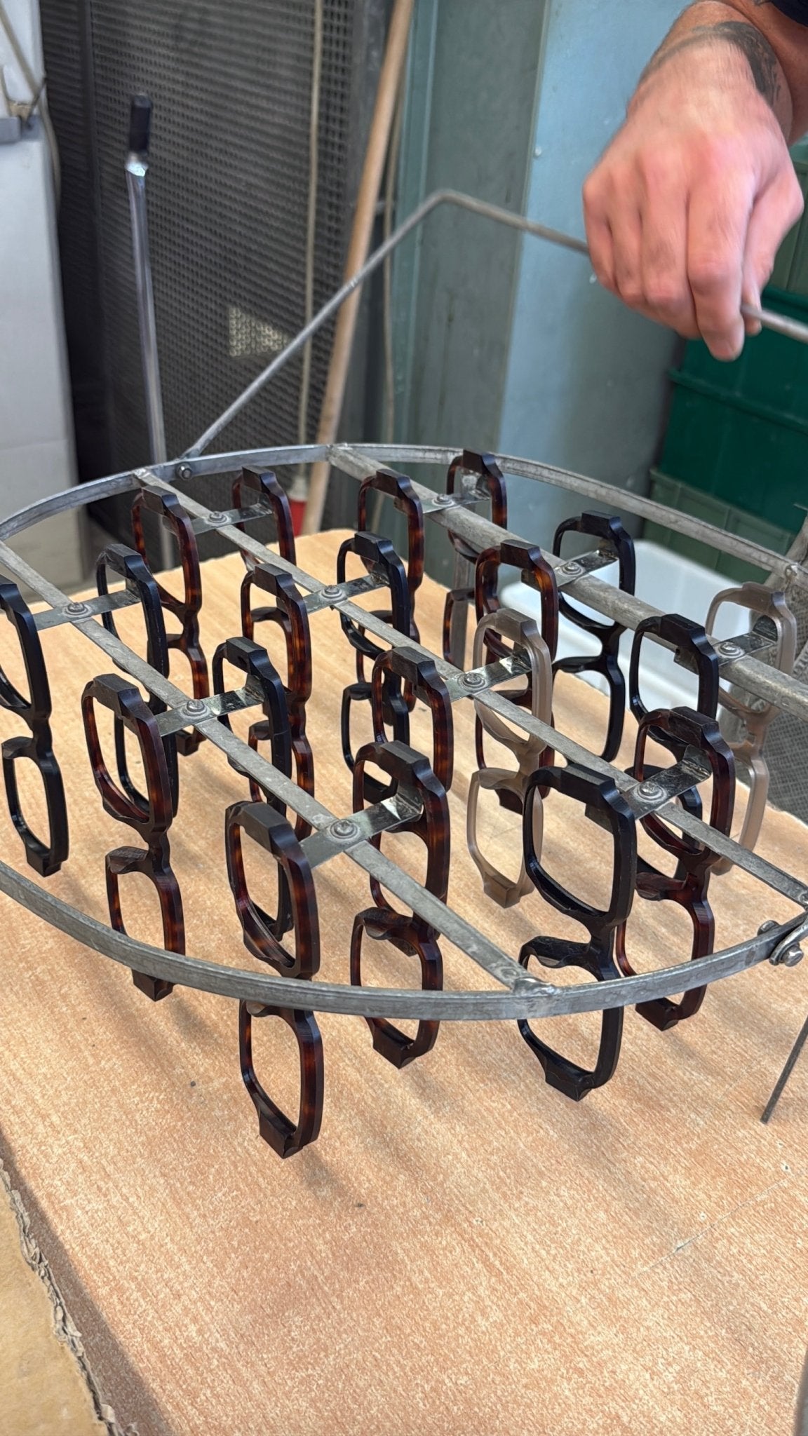 Cubo Eyewear acetate frames undergoing the handcrafted production process in an Italian eyewear factory.