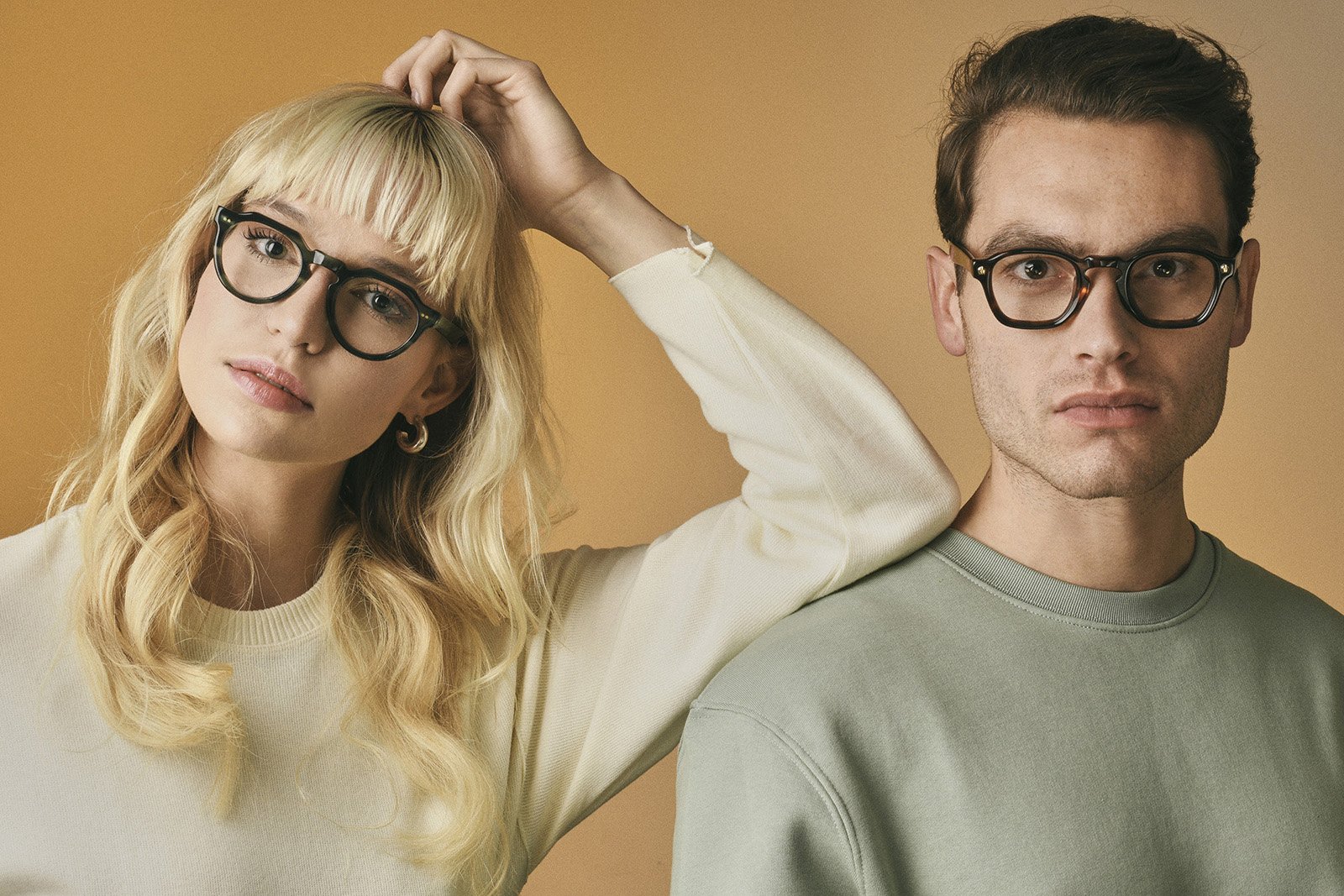 Models showcasing Cubo Eyewear frames from our premium handmade Italian eyewear collection