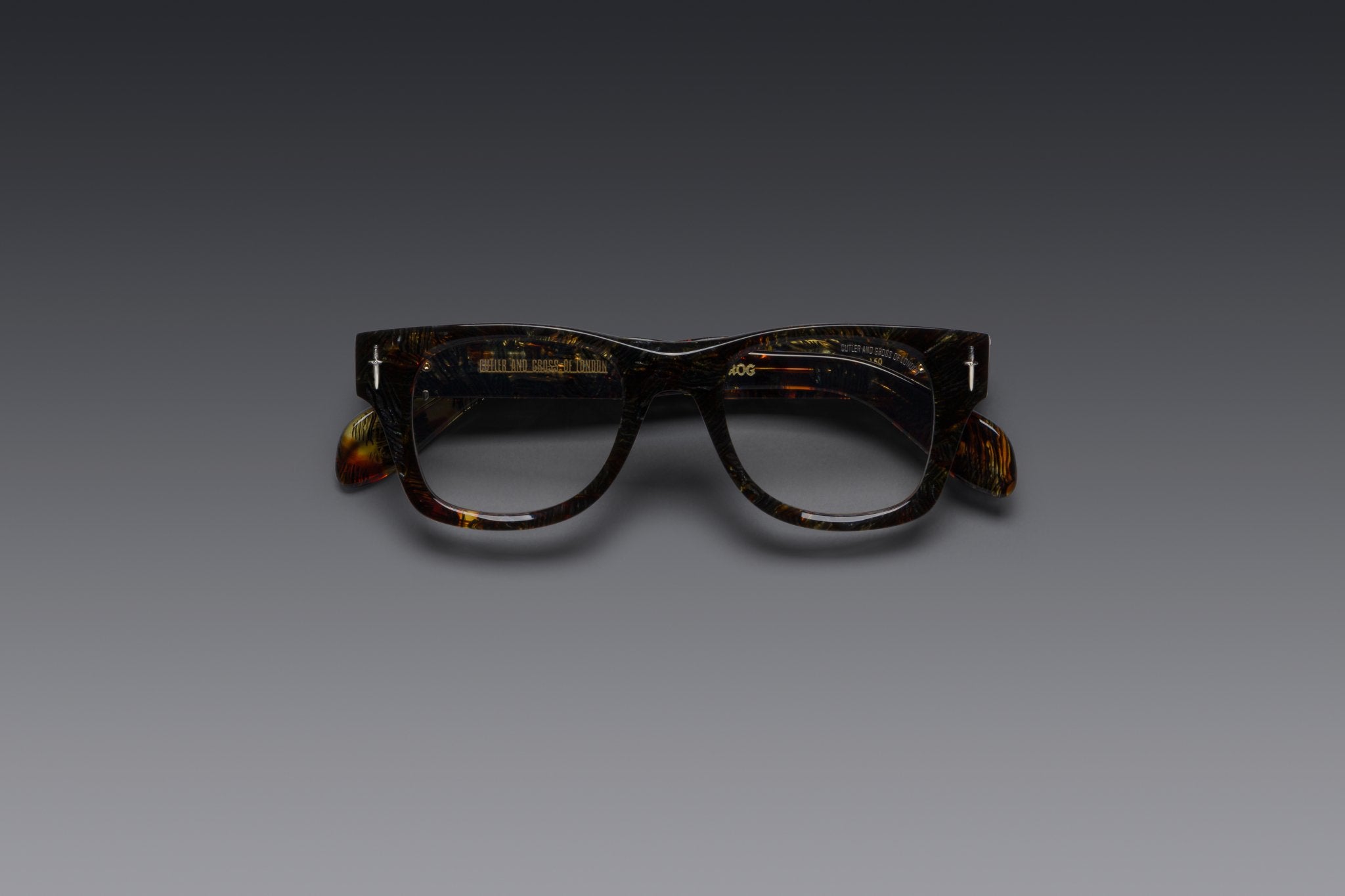 Cutler and Gross tortoiseshell eyeglasses shown in a studio product shot highlighting the signature handcrafted design