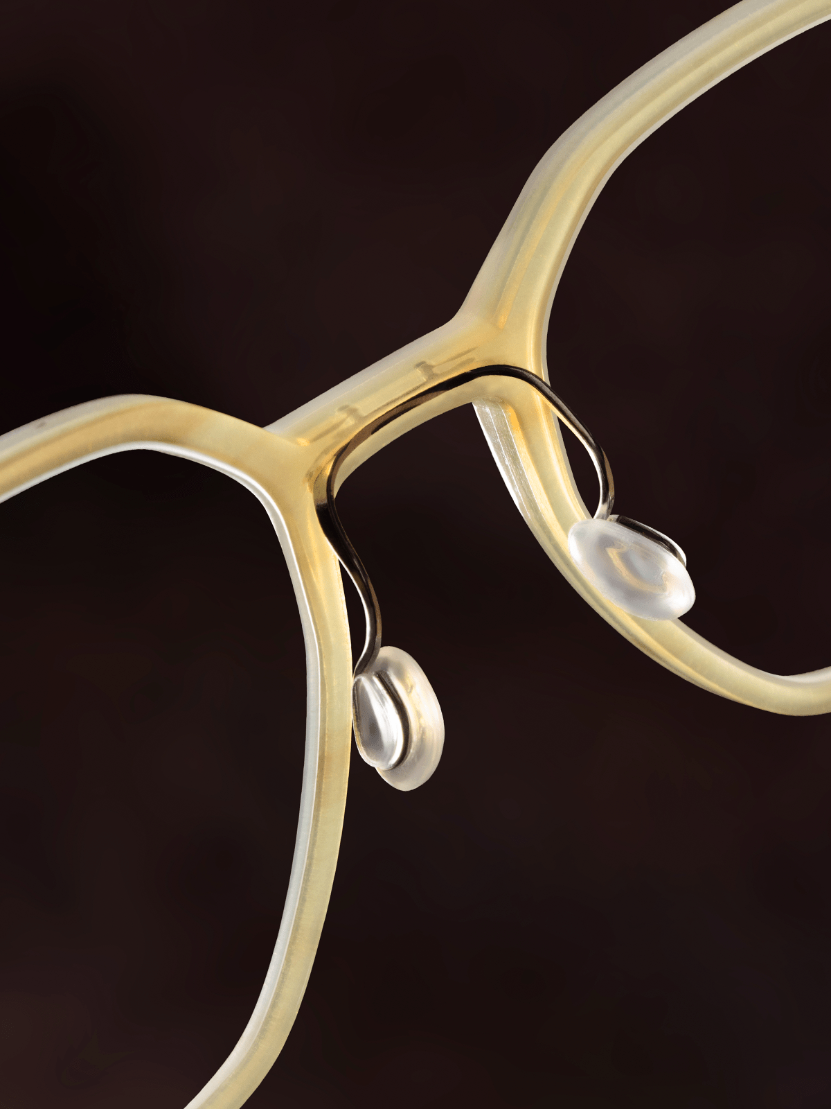 Close-up of a LINDBERG Buffalo Titanium frame highlighting the titanium bridge and adjustable nose pads in studio lighting